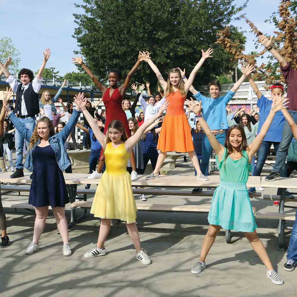 Middle school students perform in Los Angeles, where Kresge supports efforts to enhance graduation rates and college enrollment.